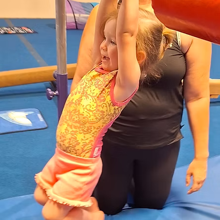 Young gymnast enjoying the Sandstorm Tots program